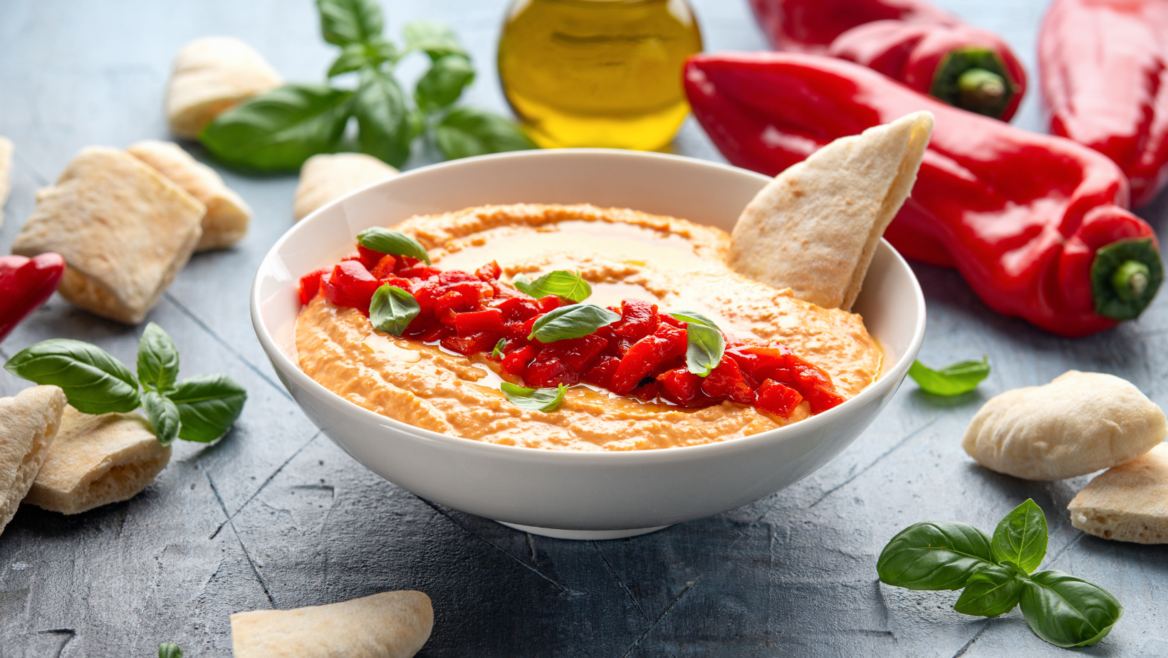 Roasted red pepper hummus with pita bread. Healthy food