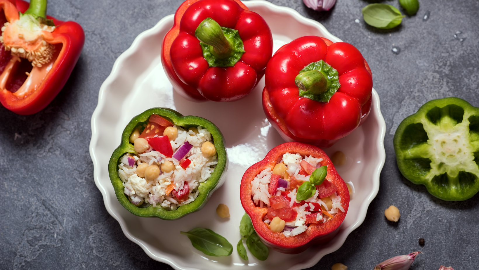 Stuffed vegetarian peppers or paprika with rice and chickpeas, vegan cooking, healthy summer lunch