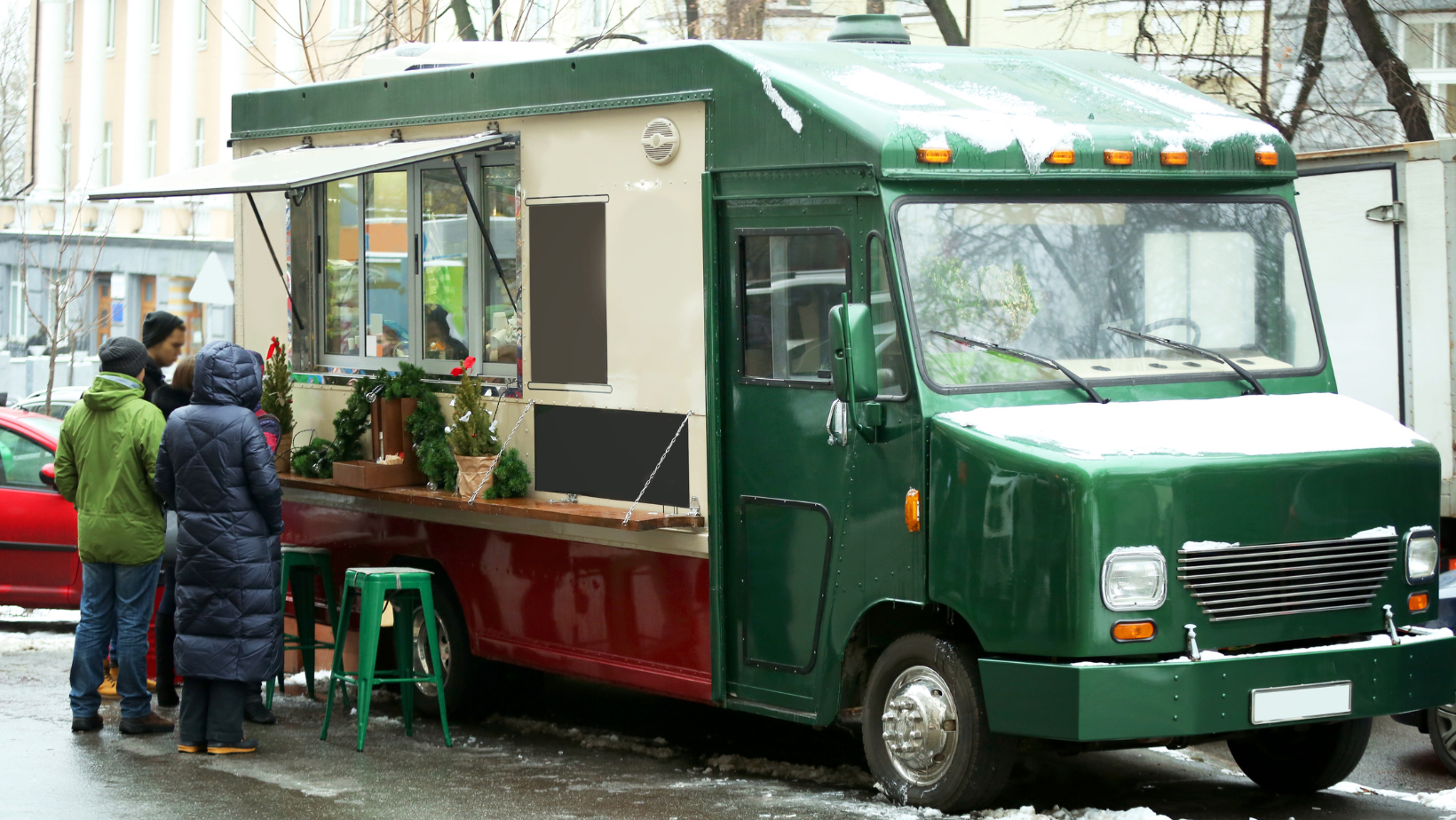 Food truck with people at Christmas fair
